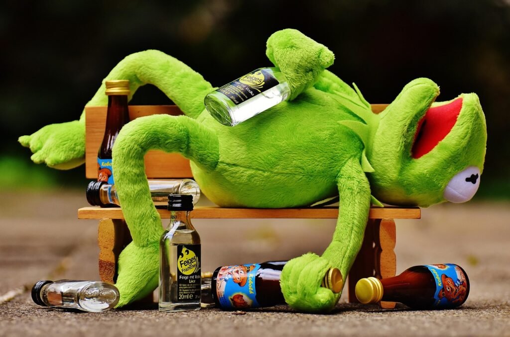 kermit, frog, drink, alcohol, drunk, bank, relax, to sit, nature, figure, fun, frogs, animal, plush, stuffed animal, kermit, frog, alcohol, alcohol, drunk, drunk, drunk, drunk, drunk